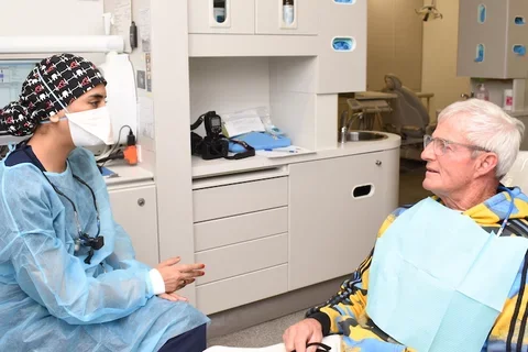 Dentist Consulting with patient.