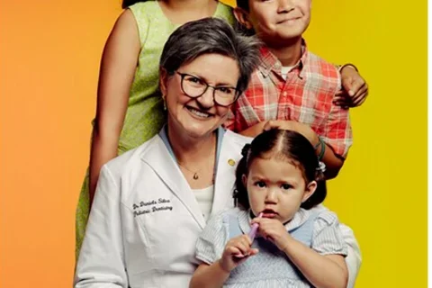 Dr. Daniela Silva with pediatric patients.