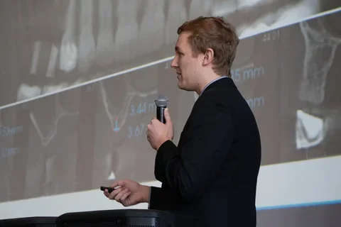 Carson Hunt presenting research