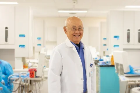 Dr. Henry Takei in a clinical setting