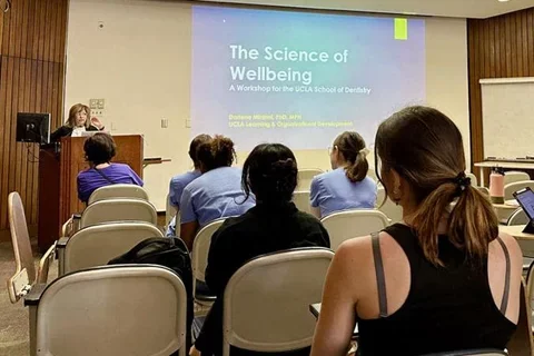 students attending lecture on the science of wellbeing