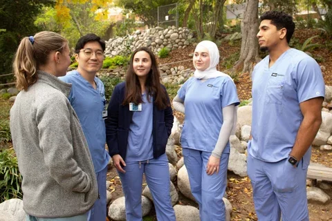 five people chatting