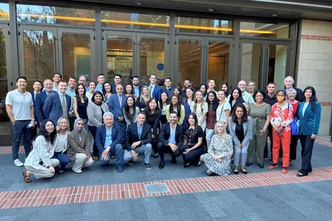 group of people in front of hotel