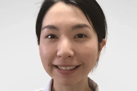 Dr. Takano's smiling in a headshot.