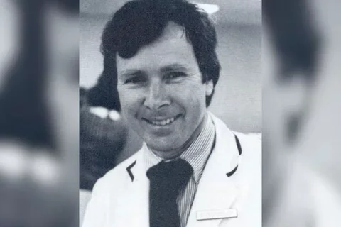 Black and white photo of Dr. William Solberg, smiling