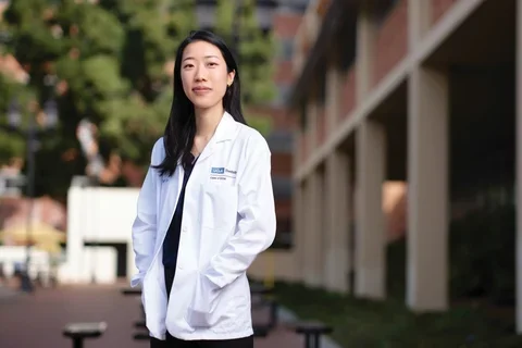 Yi-Ling Loo wearing a white lab coat