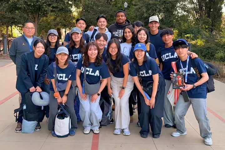 Large group of people wearing blue UCLA sweatshirts