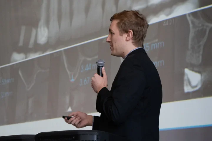 Carson Hunt presenting research