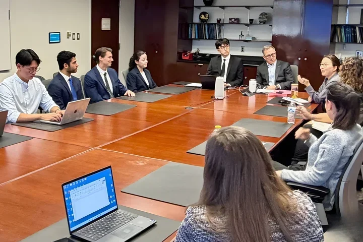 Group of people at conference table 