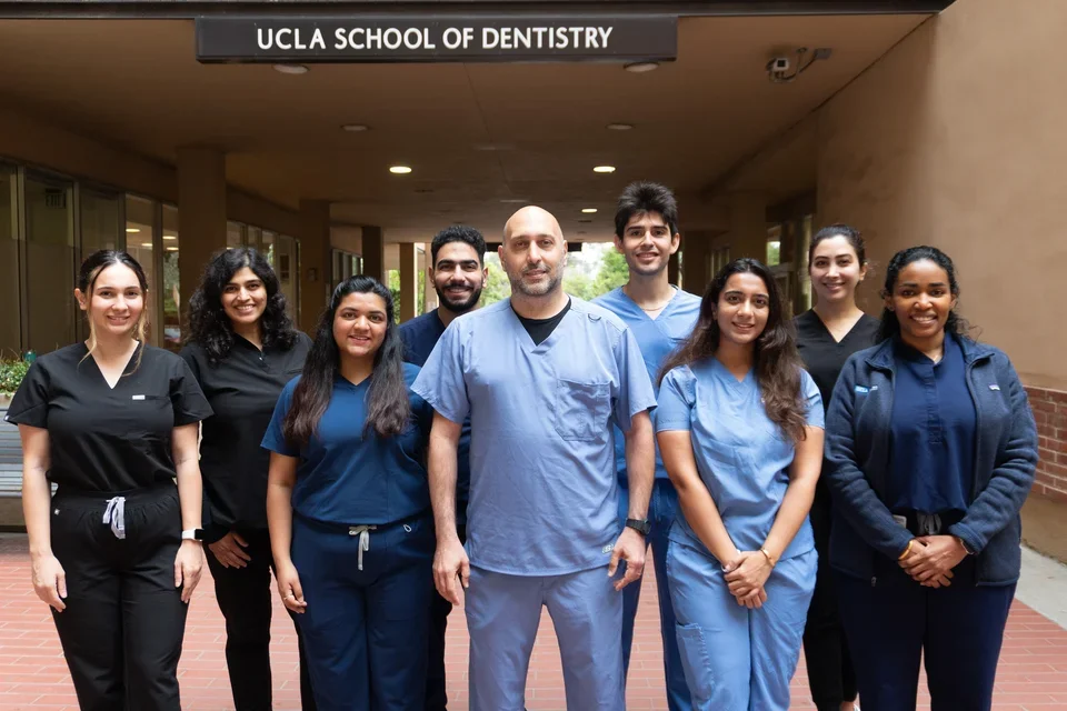 A group picture of the Orofacial Pain and Dysfunction resident and program director.