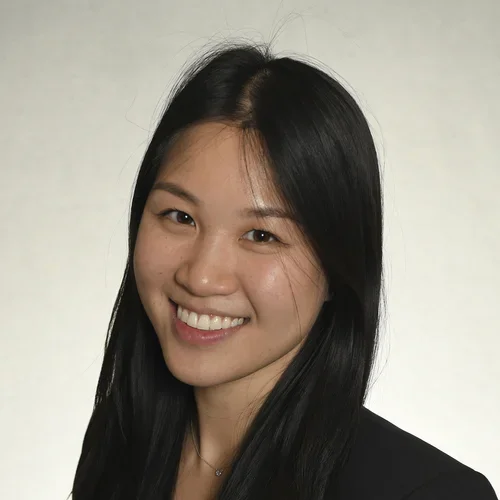 Colleen is smiling in a headshot