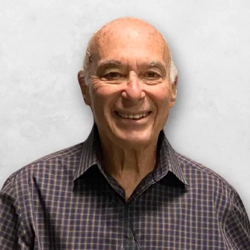 Dr. Sigmund Abelson in a plaid shirt