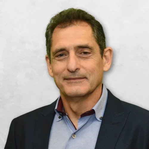 Head sot of Dr. Tetradis is wearing a suit