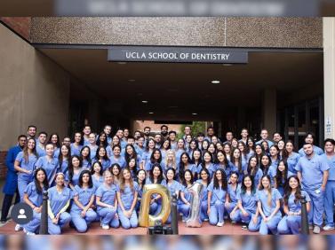 Group of dental students in scrubs