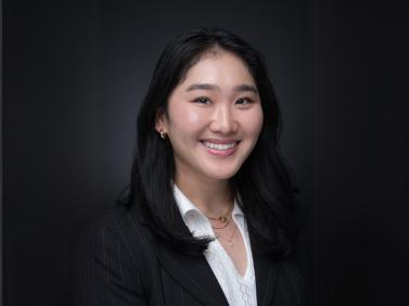 Tiffany chen, smiling in a black blazer