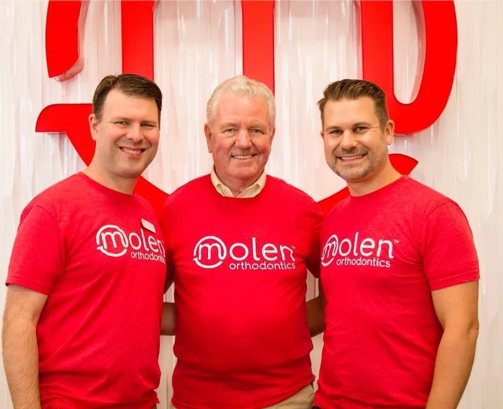 Dr. Bruce Molen, center, with his sons