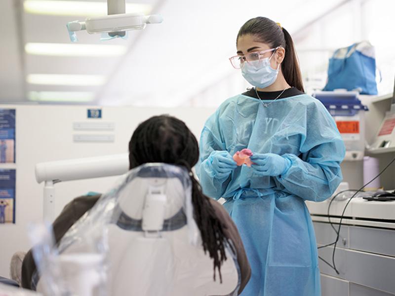 A dental student in the General Clinic.