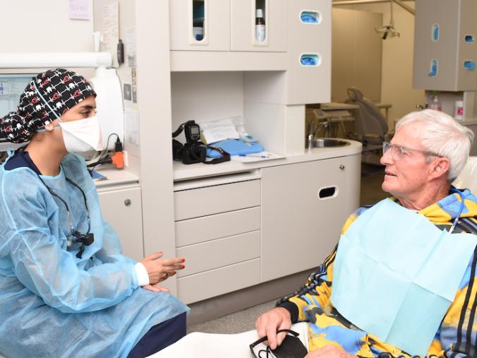 Dentist Consulting with patient.
