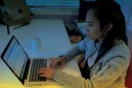 A UCLA dental student studying at home.