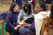 Yvonne Hernandez-Kapila (left) helping with survey work in Kenya