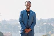 Martin Jarmond, standing with hands clasped, atop UCLA's Janss Steps