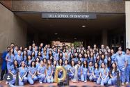 Group of dental students in scrubs