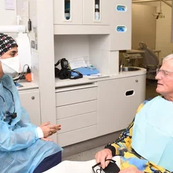 Dentist Consulting with patient.