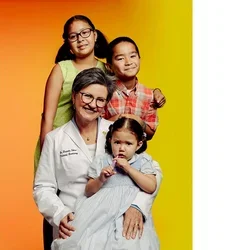 Dr. Daniela Silva with pediatric patients.