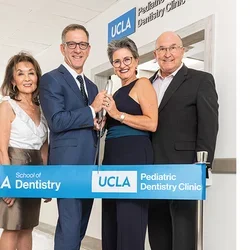 From left to right, Dr. Oariona Lowe, PD ’84, MPH ’16, Dr. Paul Krebsbach, dean of the UCLA School of Dentistry, Dr. Daniela Silva, chair of pediatric dentistry, and Dr. Mark Lisagor ’73, PD ’77.