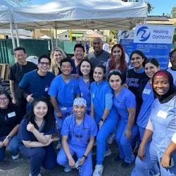 Group of UCLA dental students at a community event