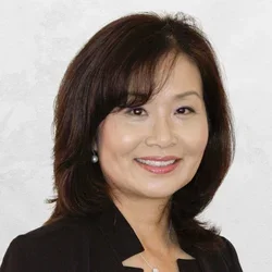 Dr. Choe is wearing a black blouse.