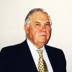 Dr. Fermin Carranza wearing a suit jacket