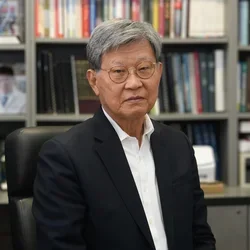 Dr. No-Hee Park, seated at a desk