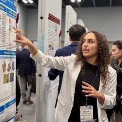Rachel Kulchar presents an academic research poster