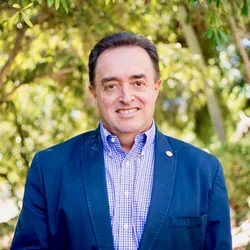 Francisco Ramos-Gomez wearing a blue blazer.