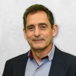 Head sot of Dr. Tetradis is wearing a suit