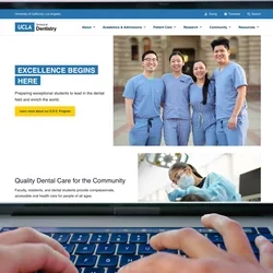 Person typing on a Macbook, viewing the UCLA School of Dentistry homepage