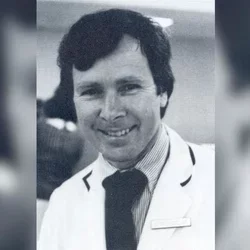 Black and white photo of Dr. William Solberg, smiling