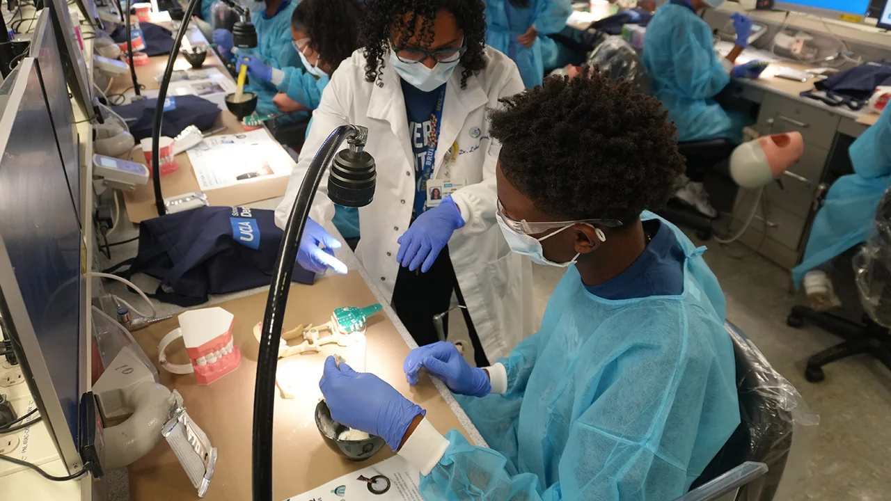 Diversity in Dentistry Mentorship student with a UCLA Dentistry Faculty in the lab.