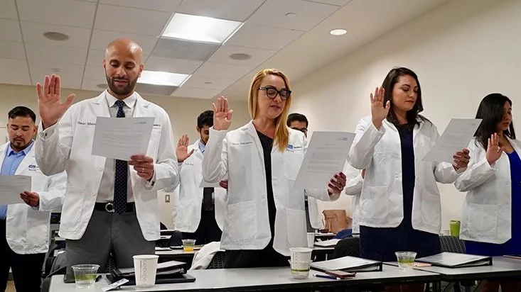 International dentists taking oath