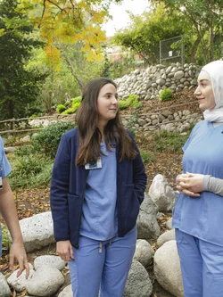 Students standing in botanical garden
