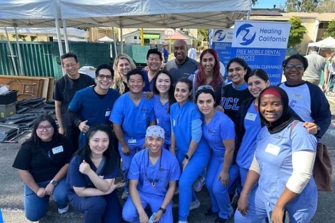 Group of UCLA dental students at a community event