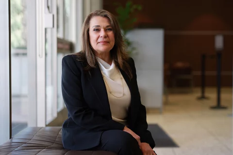 Dr. Fariba Younai, sitting
