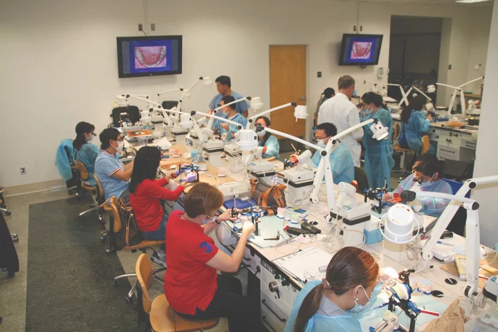 Continuing Education students working in lab