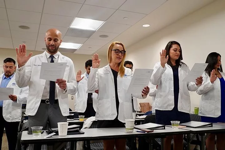 International dentists taking oath