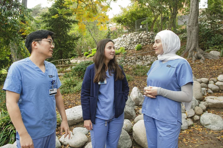 Students standing in botanical garden