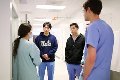 Dr. Mincer in a group meeting with dental students.