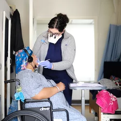 Dental care to a patient in a wheelchair