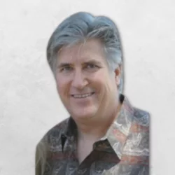 Dr. Uhrik is wearing a multi-colored shirt.