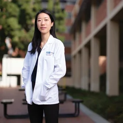 Yi-Ling Loo wearing a white lab coat